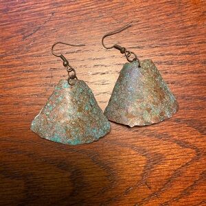 Metal earrings with natural verdigris